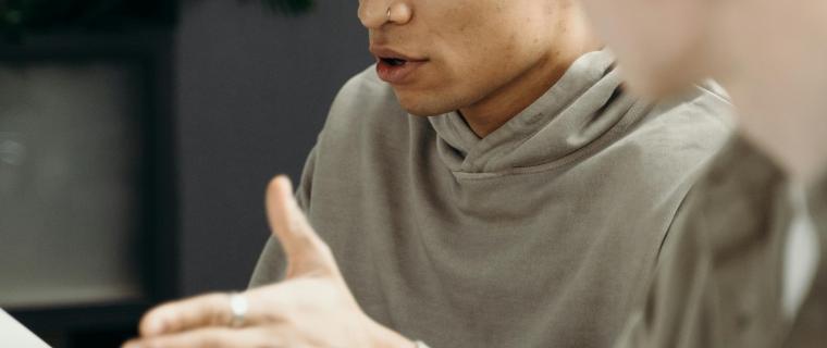 Photo of student in meeting speaking