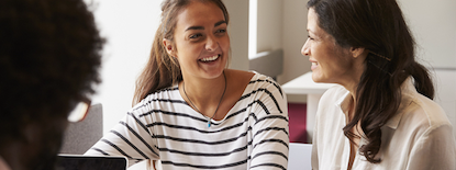 Mother and daughter meeting with an educator