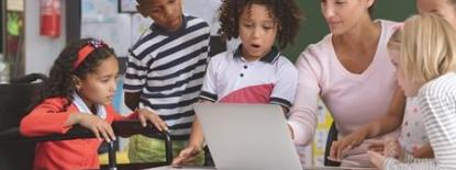 Image of people sitting aroung a table talking