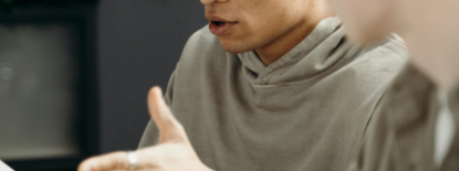 Photo of student speaking at meeting